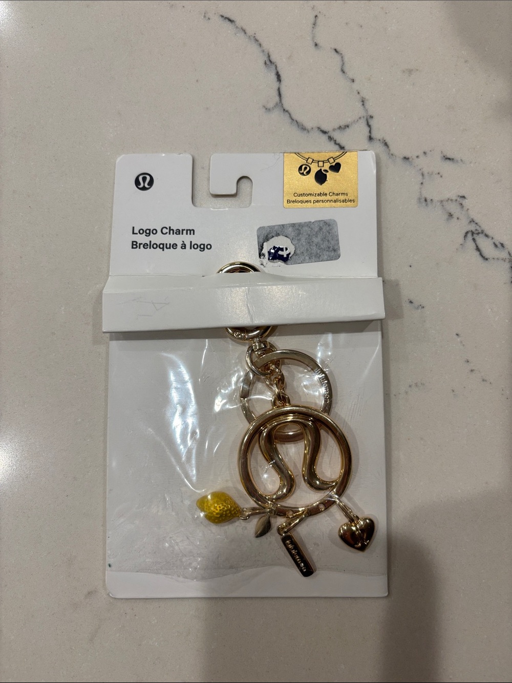 lululemon from Australia RARE Gold Logo 3 Charm Set NWT